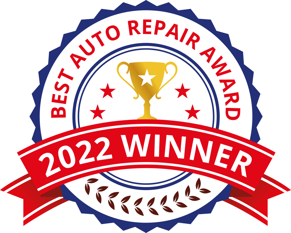 Red and white award badge reading “Best Auto Repair Award” and “2022 Winner” with a gold trophy icon