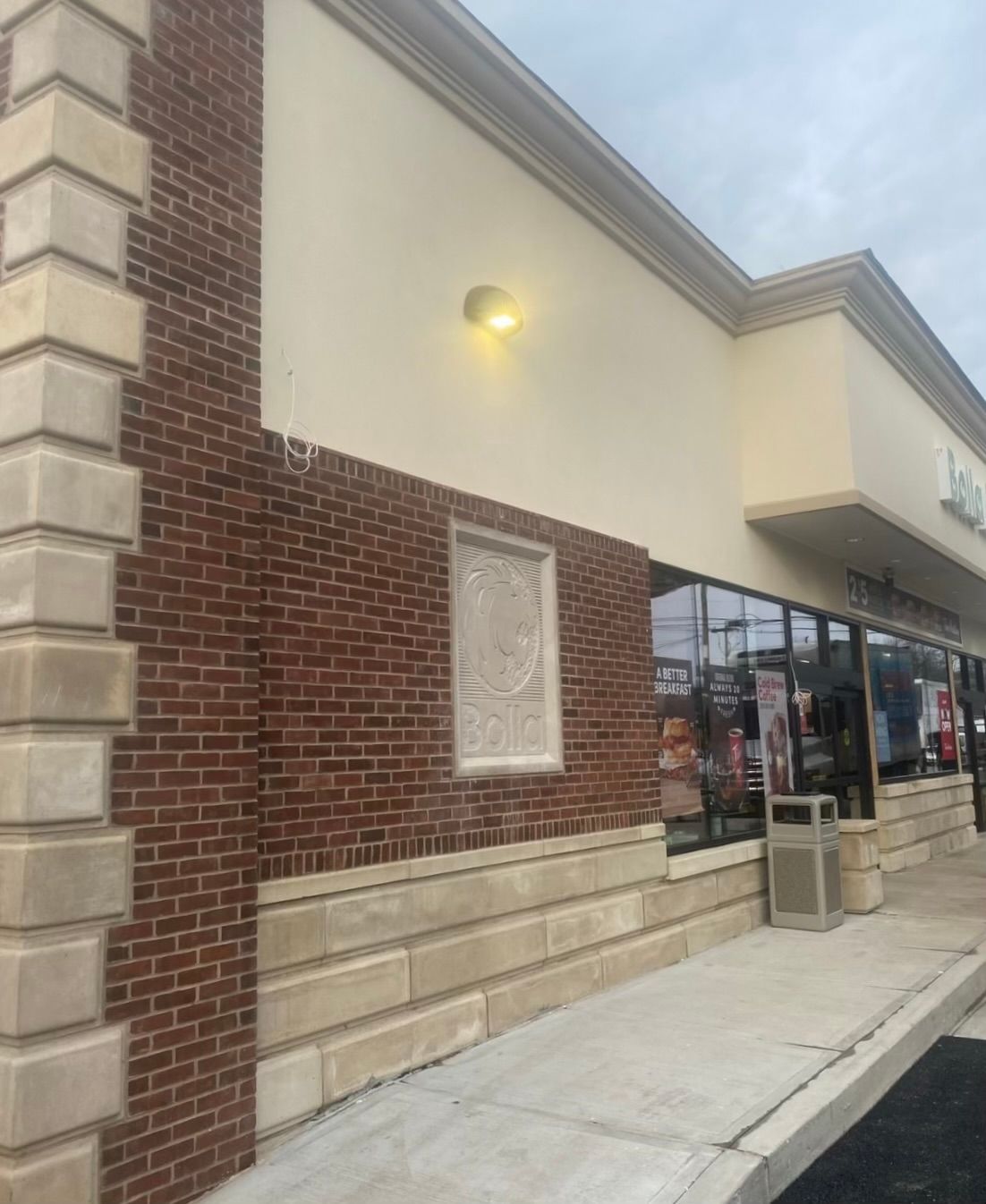Brick Building With Signage — Staten Island, NY — J. Molfino Masonry