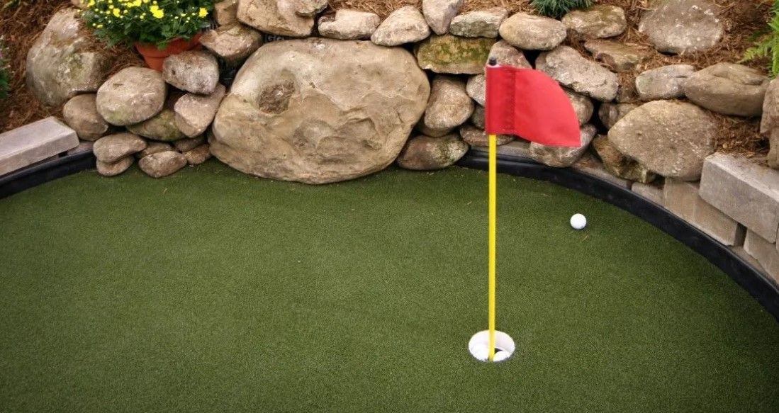 artificial grass putting green in backyard