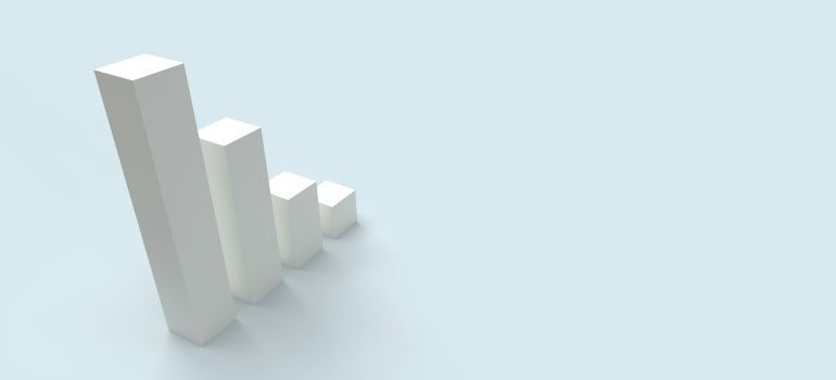 White 3D bar chart bars rising from left to right on a pale blue background