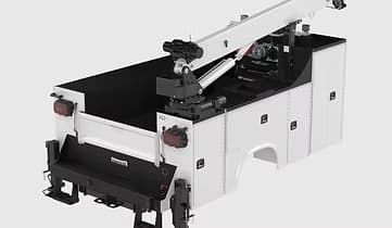 White service truck bed with crane, black bed interior, and storage compartments.