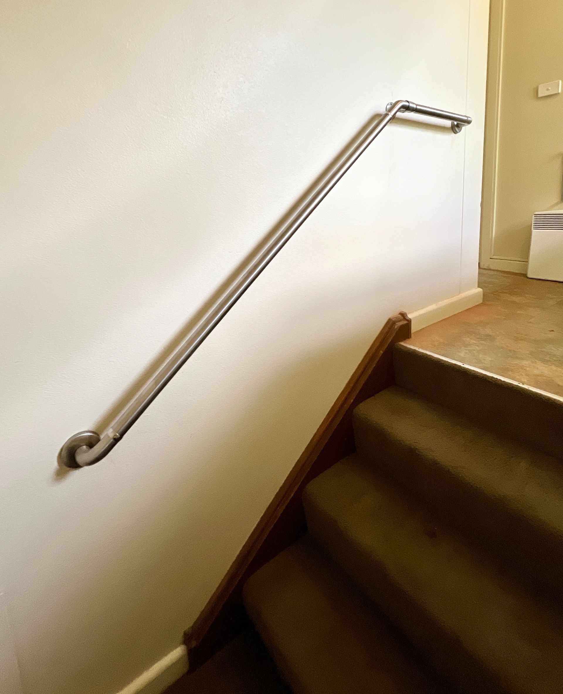 A Set Of Stairs With A Single Handrail — P & M Maintenance Building Services in Yass River, NSW
