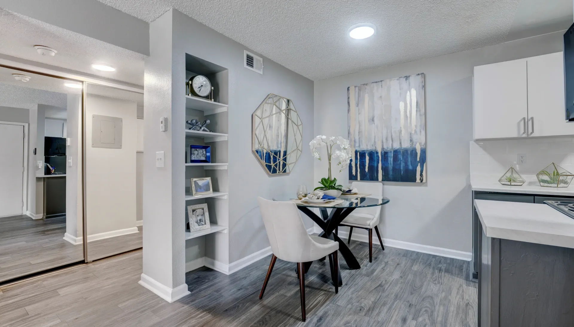 Dining area and kitchen in an apartment with modern decor