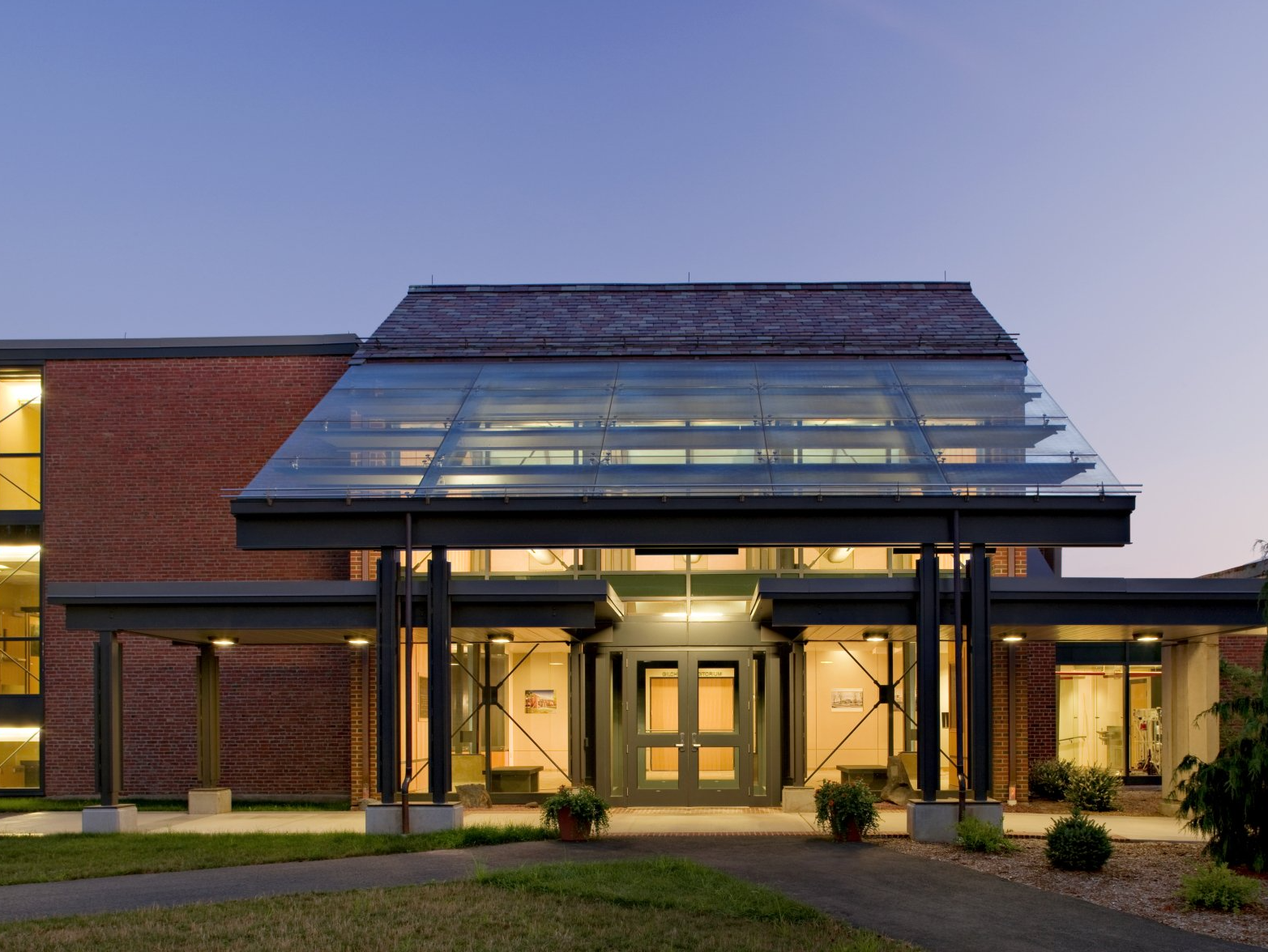 A large brick building with a glass roof