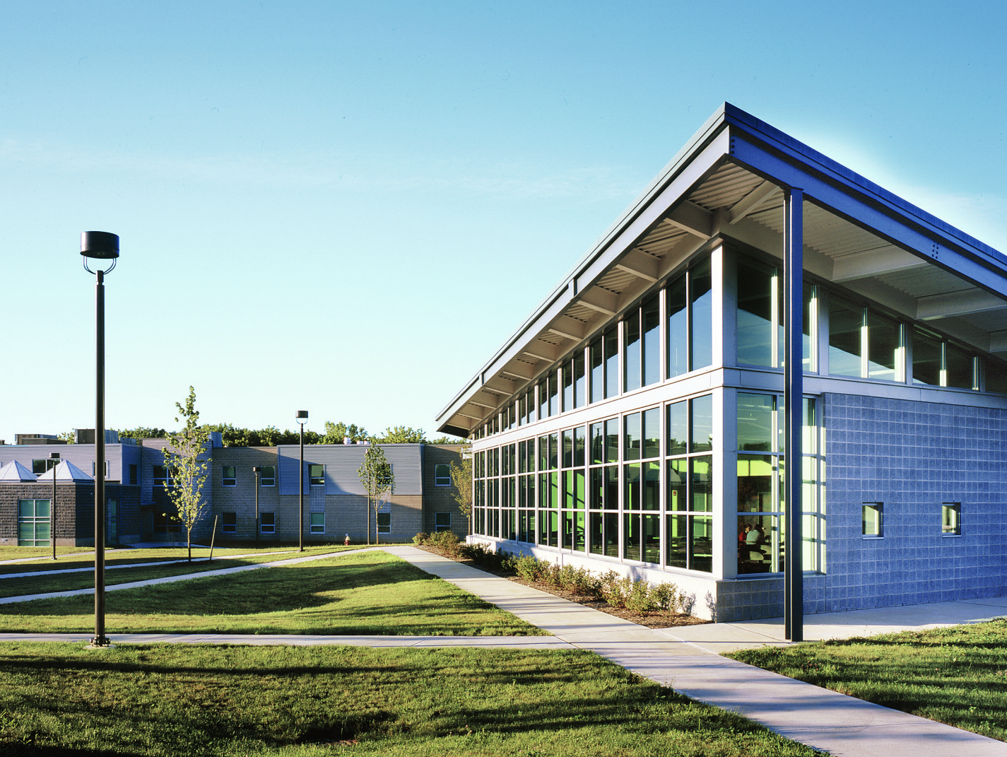A large blue building with a lot of windows