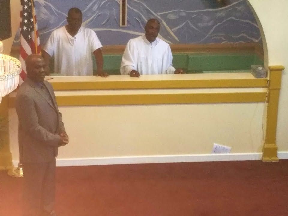Church members in warm fellowship after service