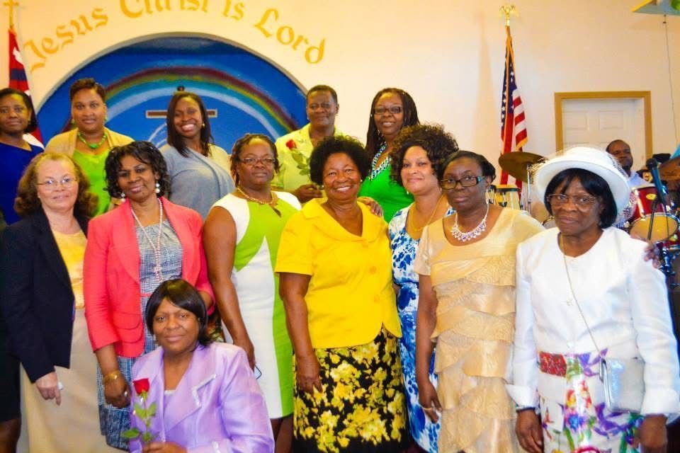 Friendly greeter team welcoming visitors at Glenway Church