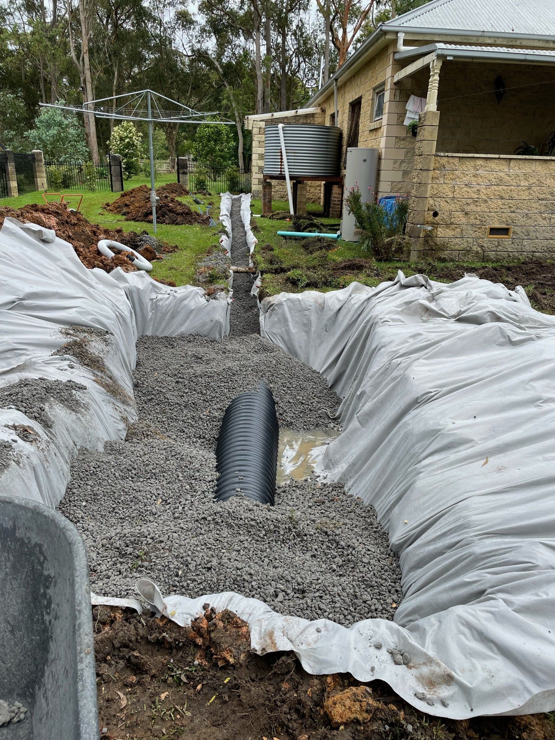 Adding Gravel on Drainage System — Raymond Terrace, NSW — NPD Plumbing & Drainage Pty Ltd
