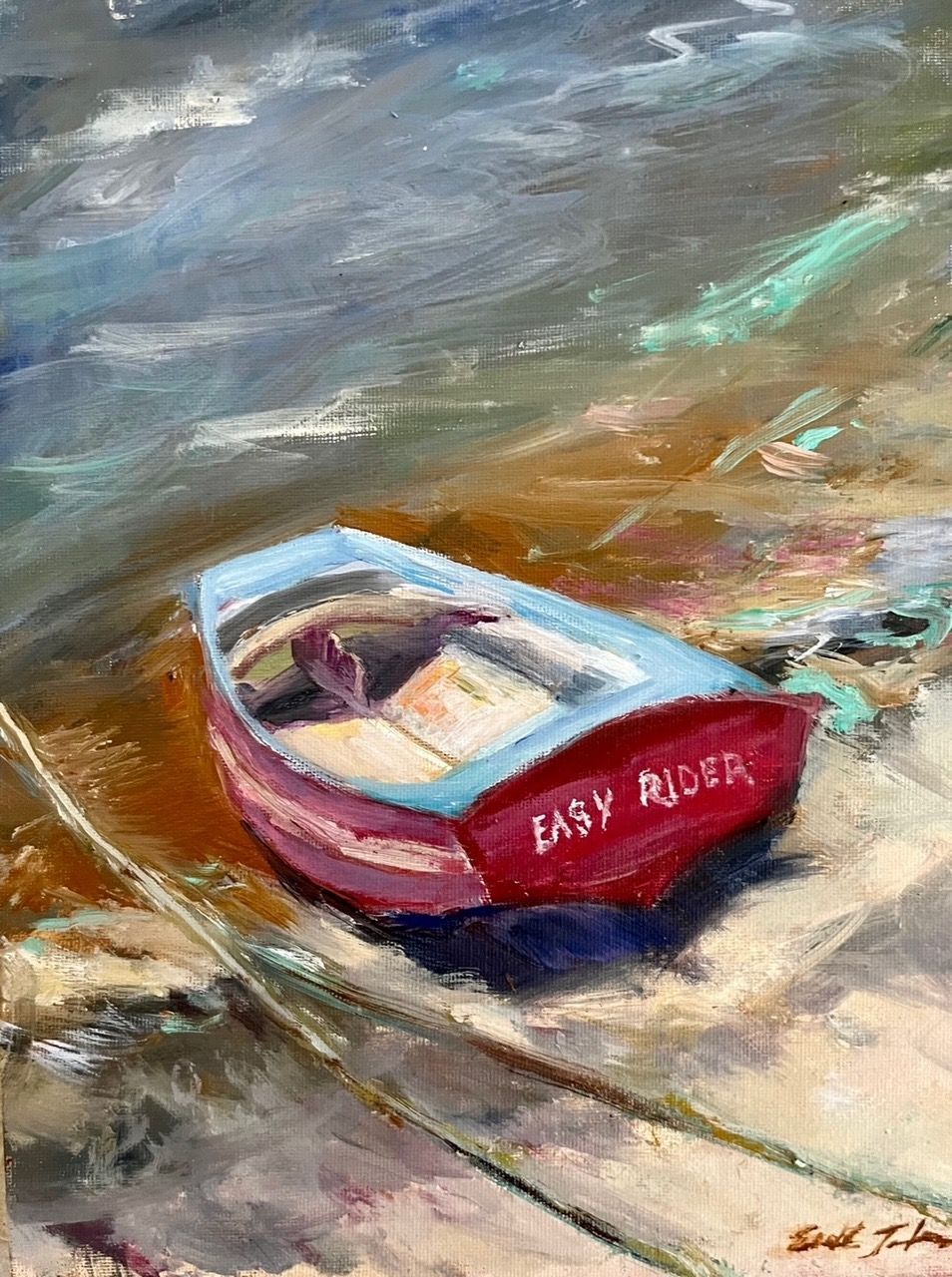 Small red boat labeled “Easy Rider” floating on choppy water, viewed from above