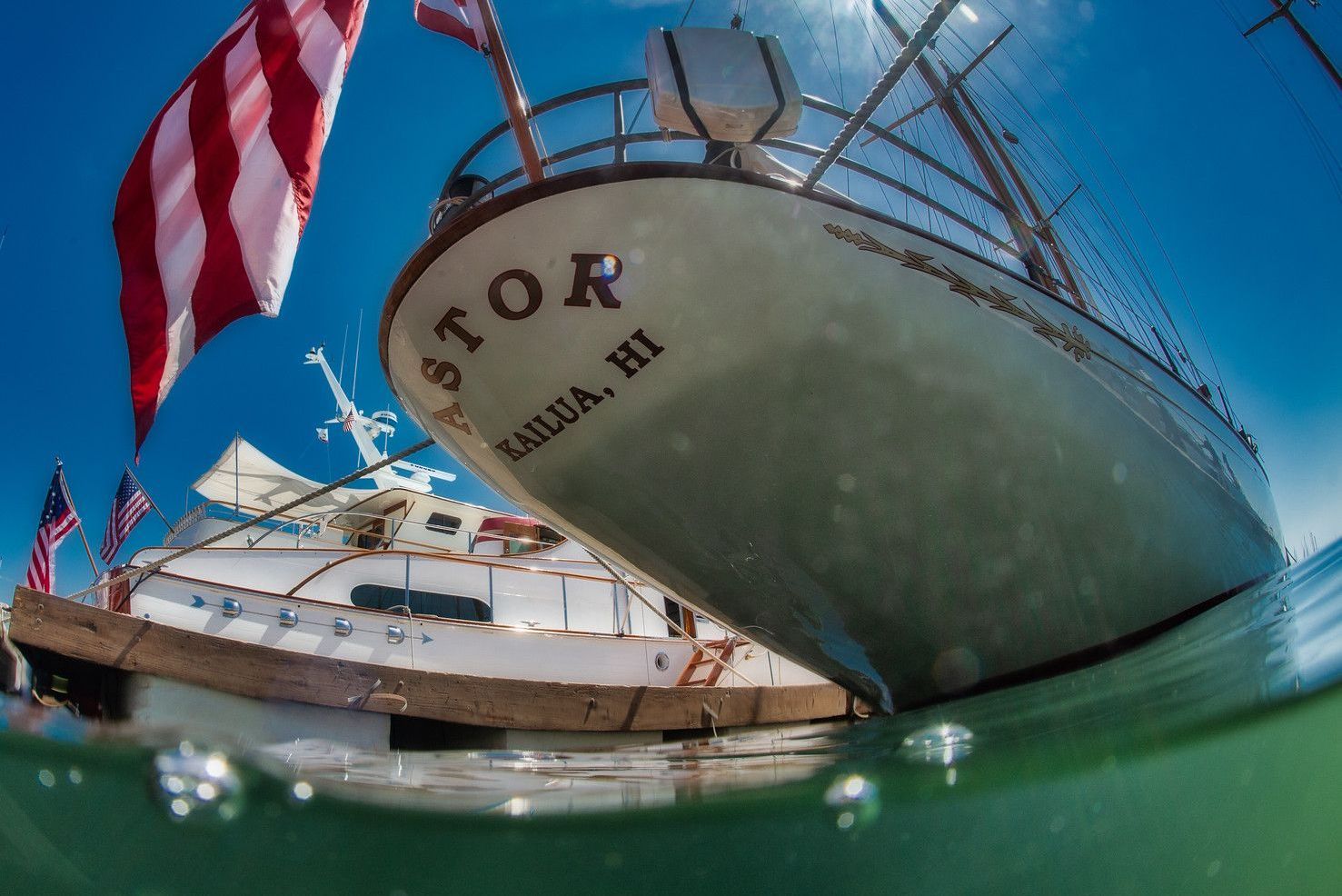 Boat stern with U.S. flag and the name 