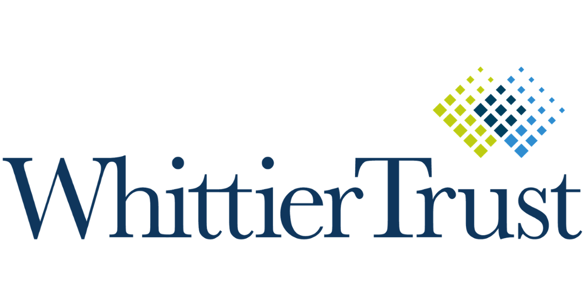 Whittier Trust logo with blue text and a small green-to-blue diamond pattern