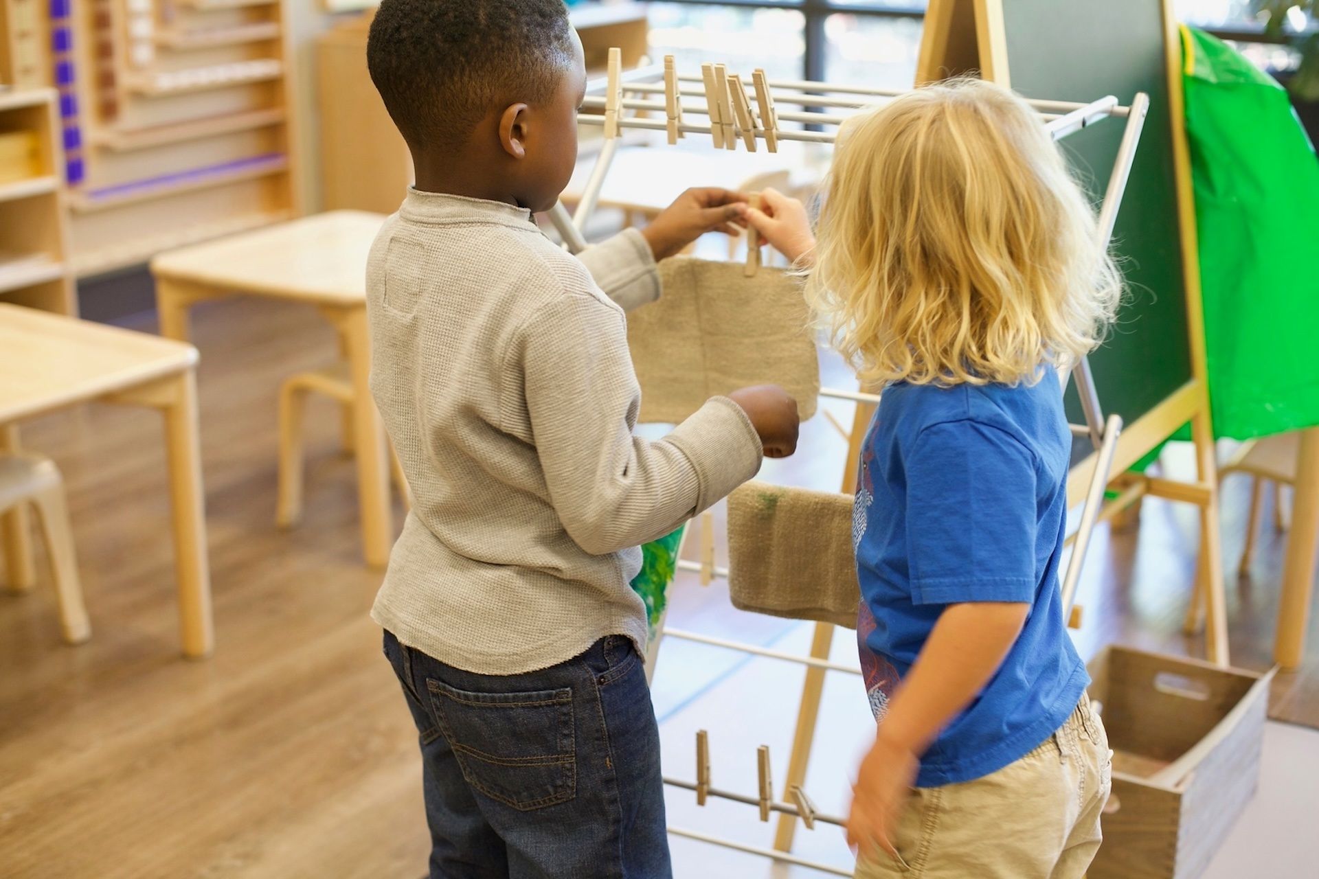 Montessori children working practical skills