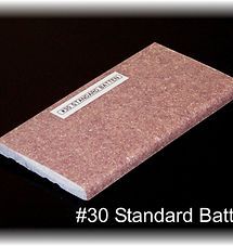 Brown rectangular battery labeled “#30 Standard Batt” on a black background