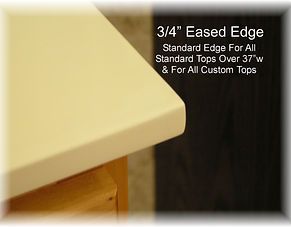Close-up of a beige countertop with a rounded eased edge, shown against a dark background.