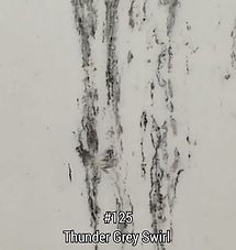 White surface with dark gray vertical swirls labeled “#125 Thunder Grey Swirl”
