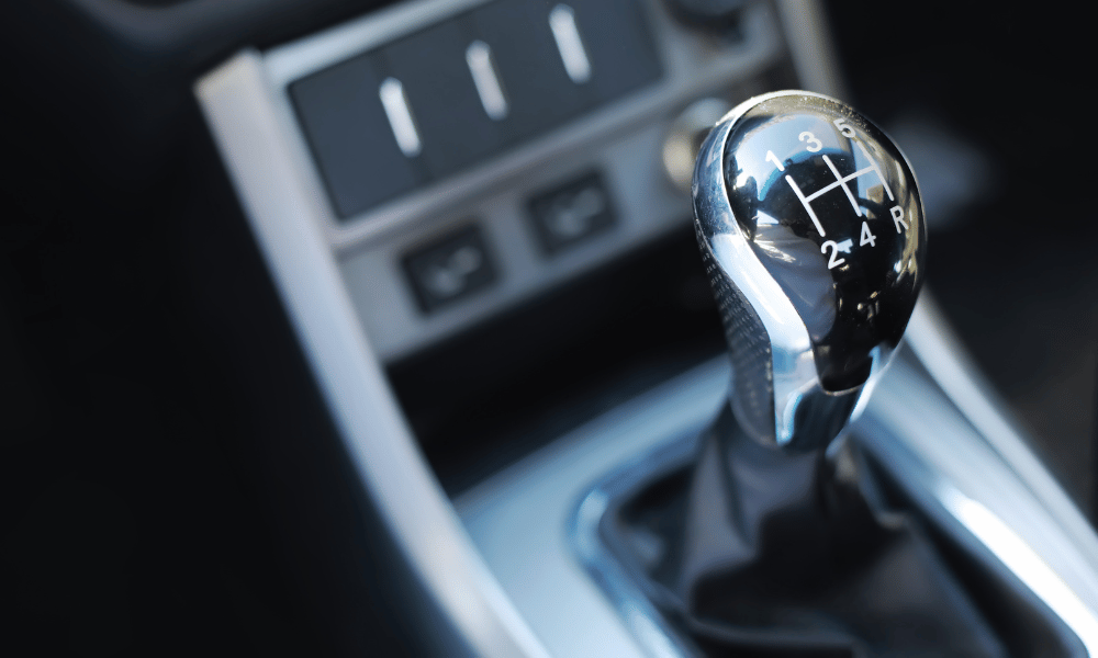 Manual transmission gear shifter inside vehicle interior