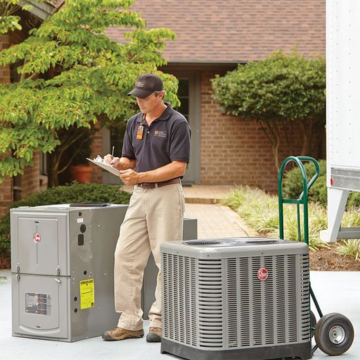 HVAC heating and air replacement at a house in Commerce, GA from Certified Comfort of Georgia technician with clipboard