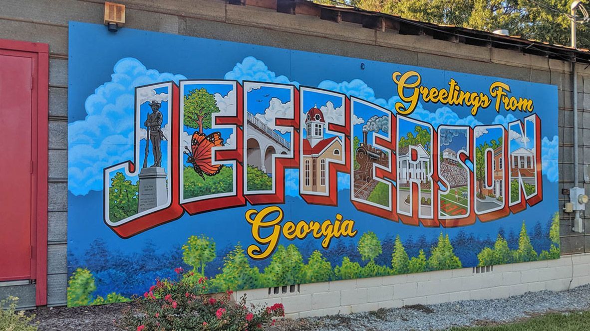 jefferson ga colorful painted sign on side of building