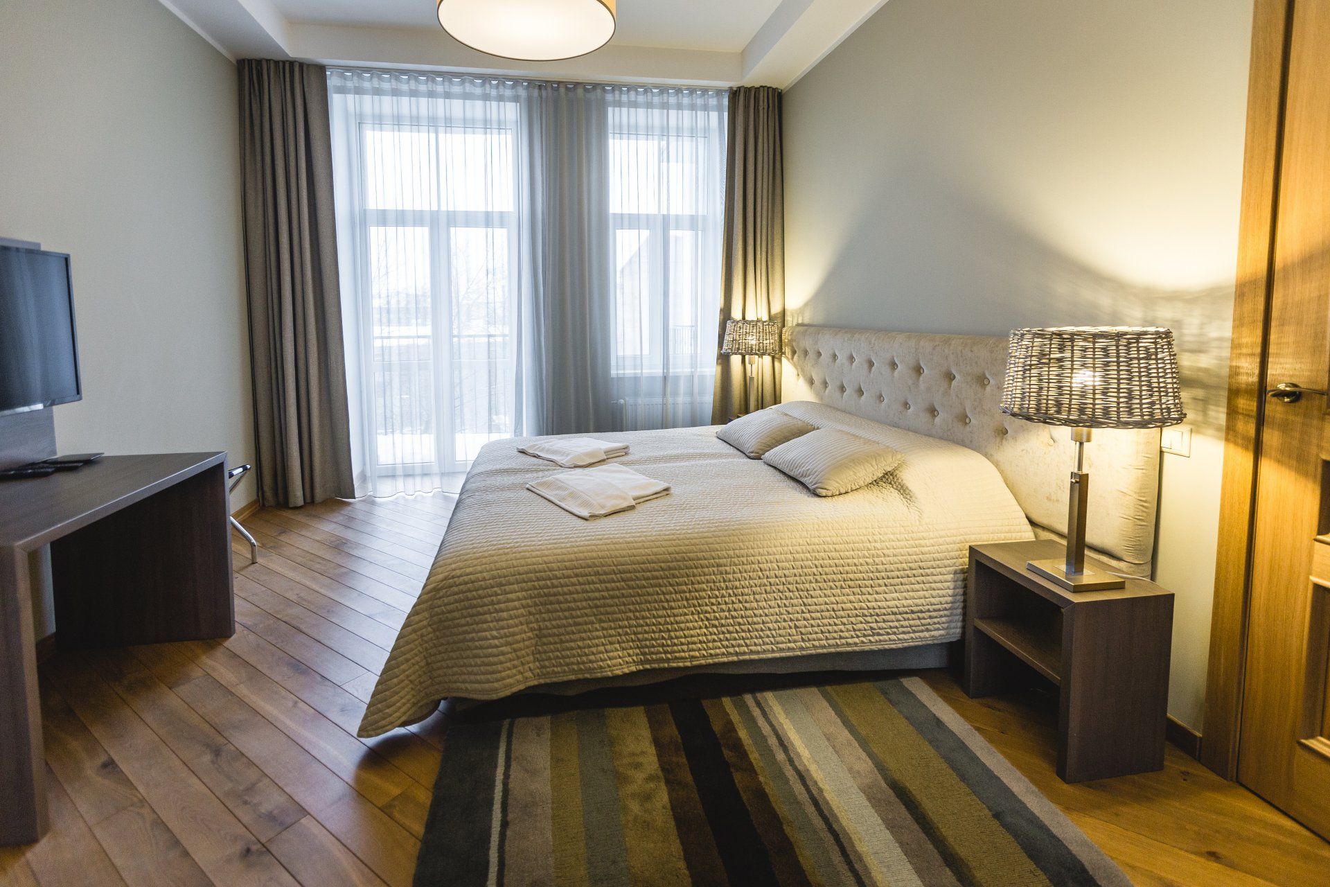 There is a large bed in the middle of the room.
