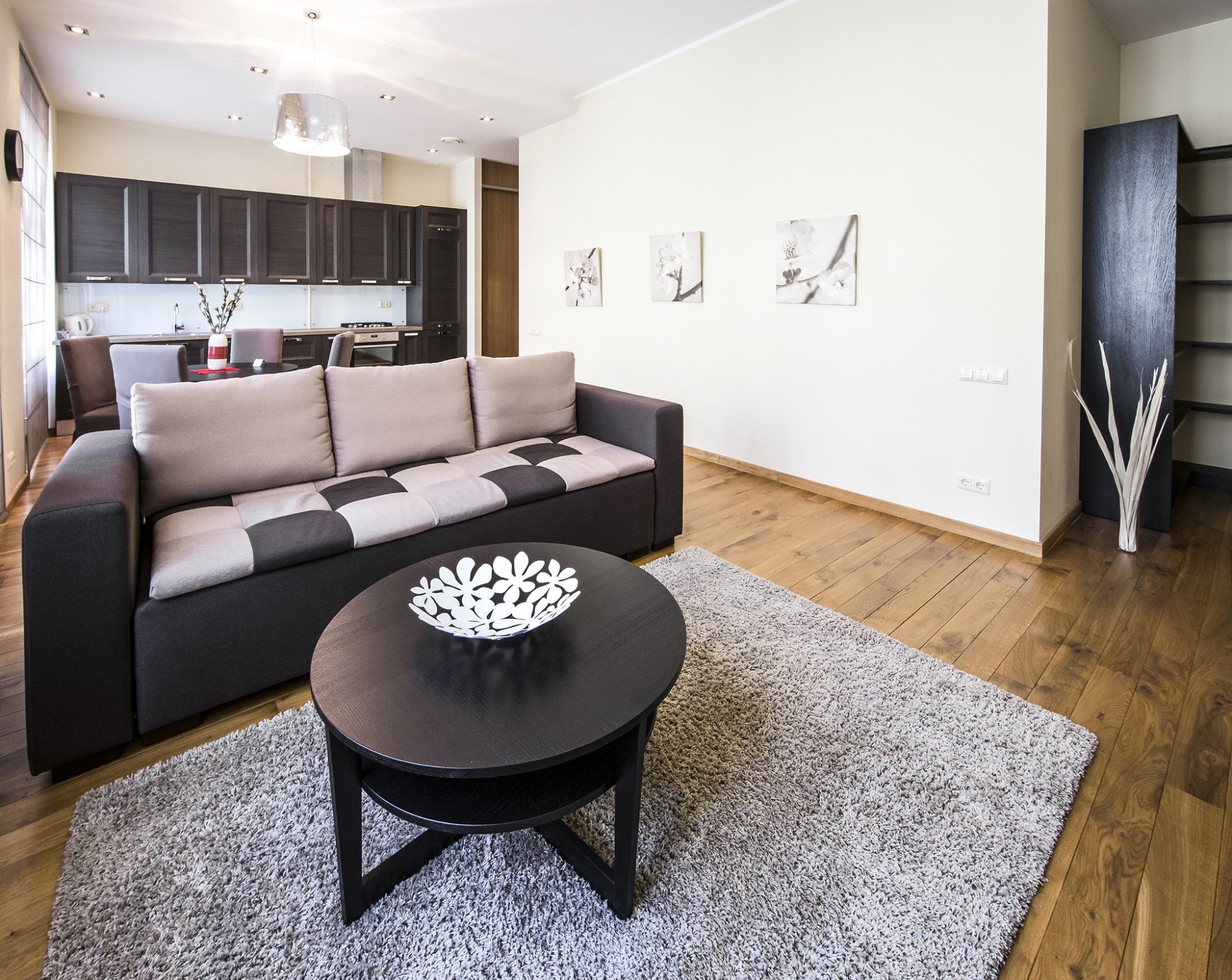 A living room with a couch and a coffee table