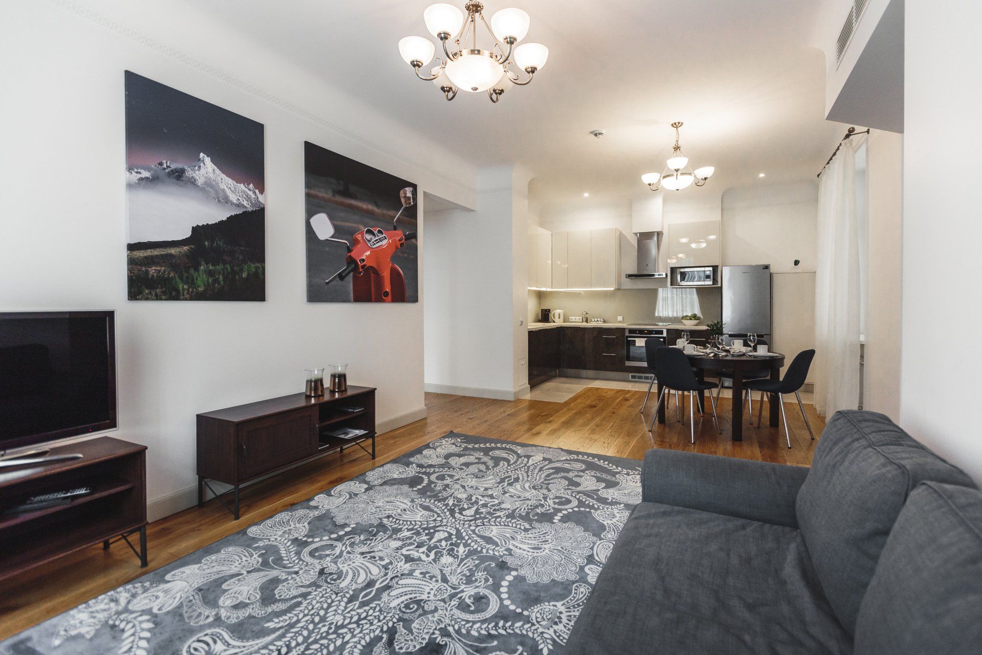 A living room with a couch and a television