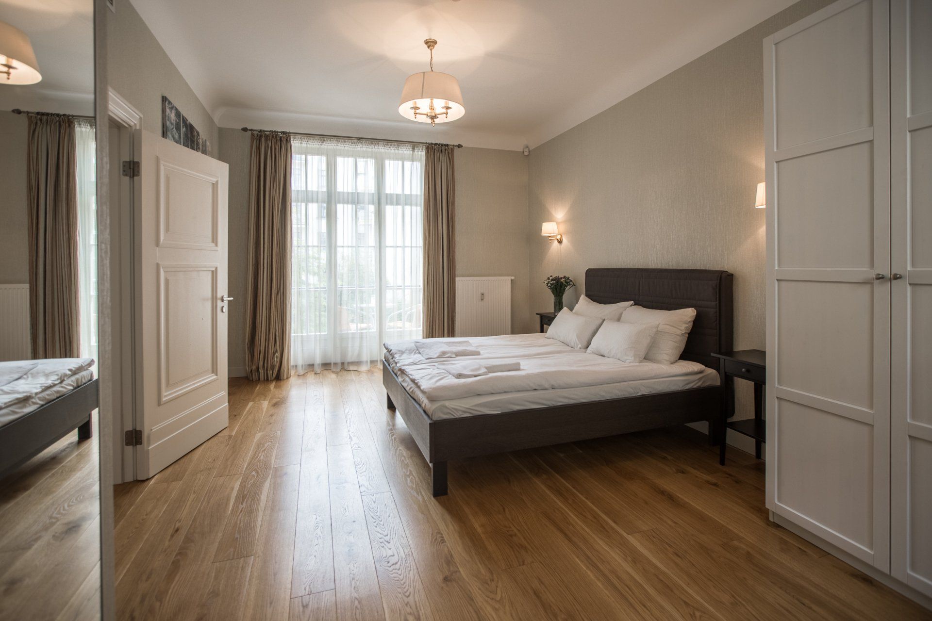 There is a large bed in the middle of the room.