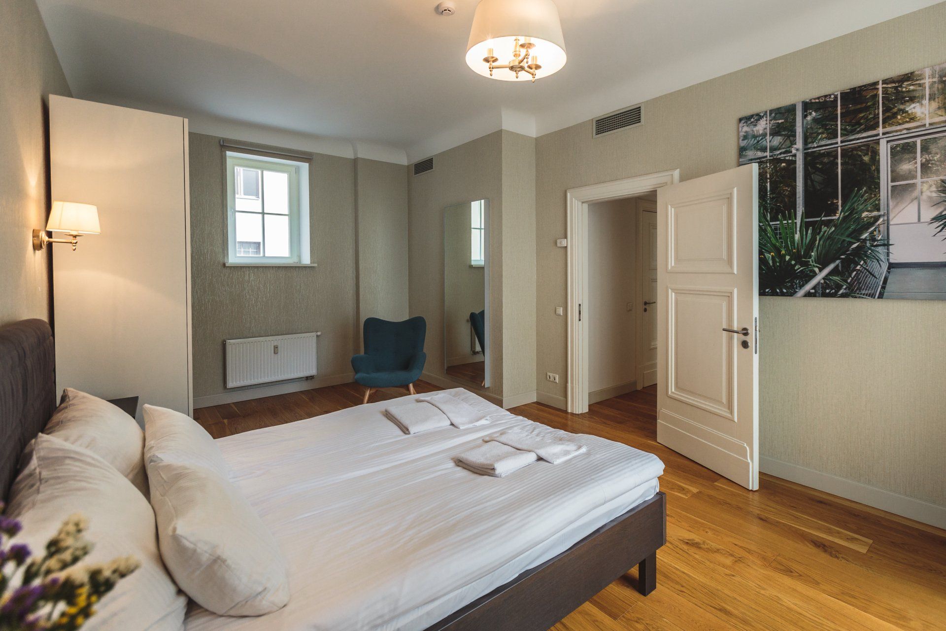 There is a large bed in the middle of the room.
