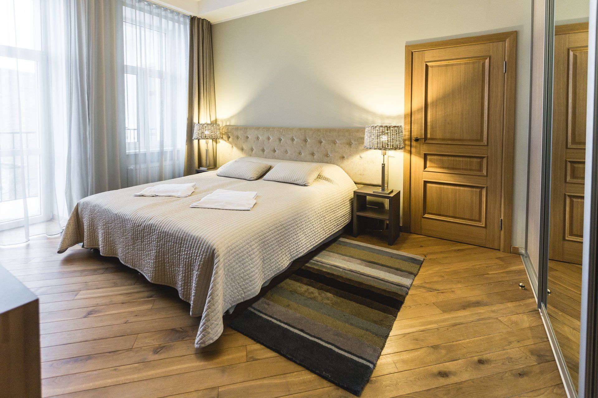 There is a large bed in the middle of the room.