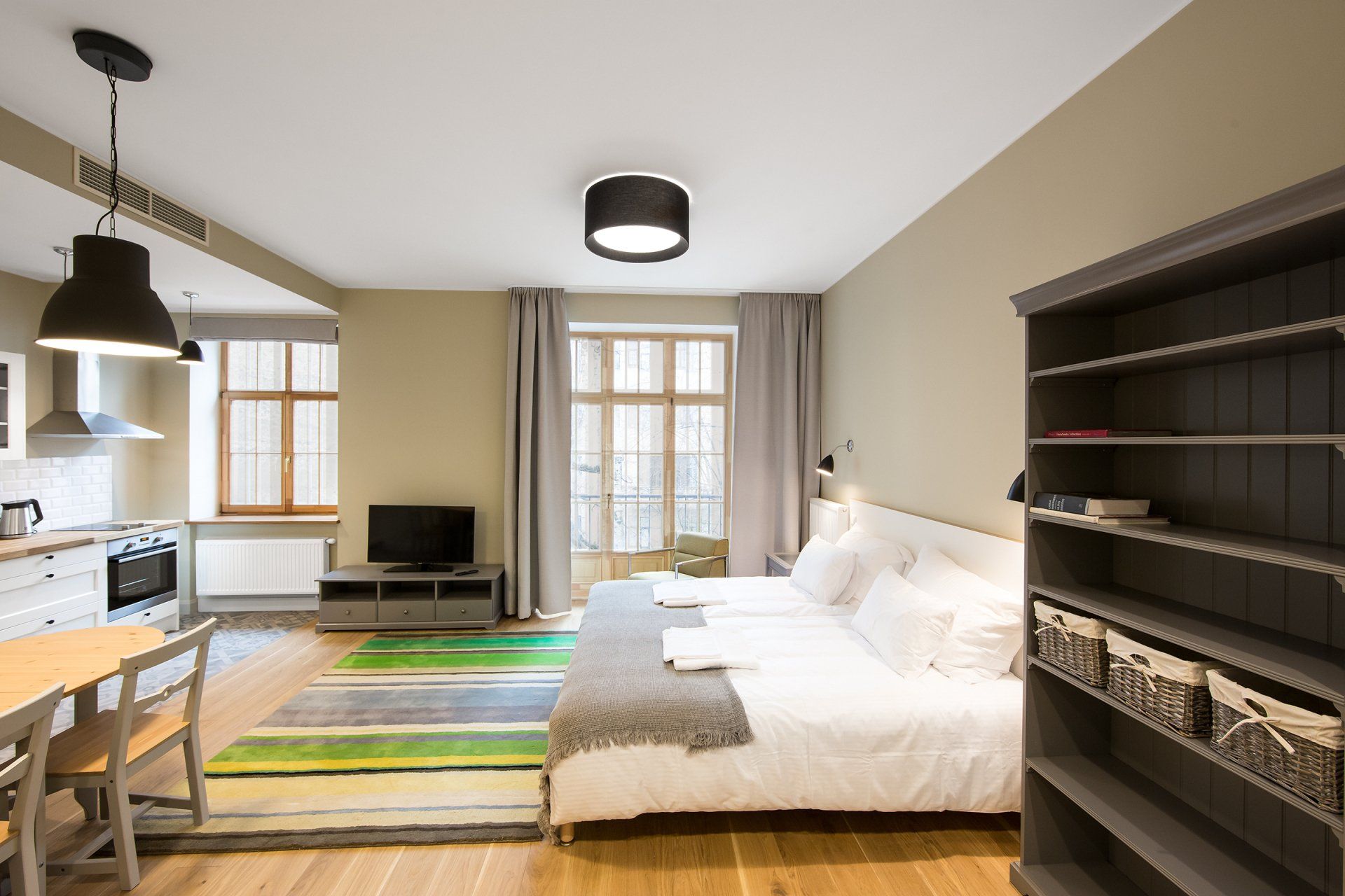 There is a large bed in the middle of the room.