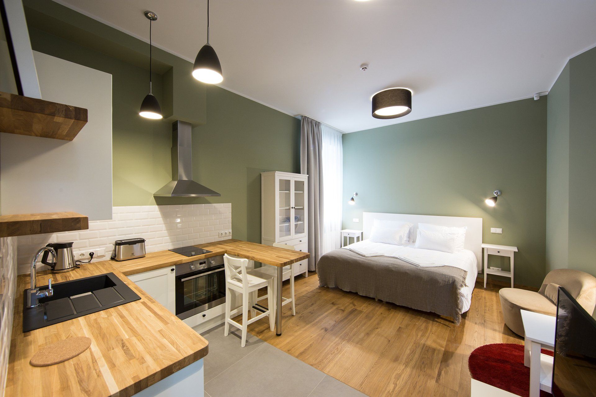There is a large bed in the middle of the room.