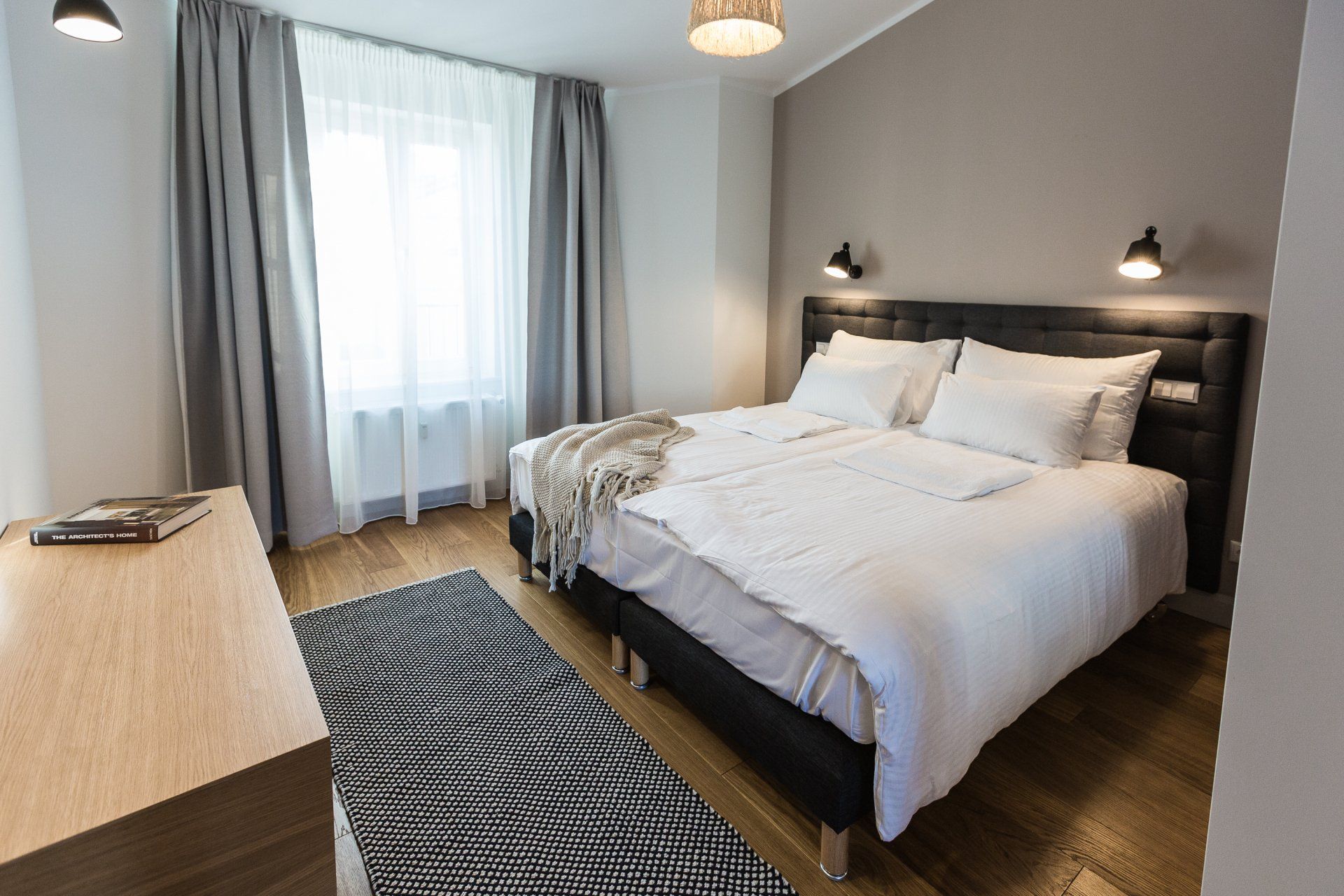 There is a large bed in the middle of the room.
