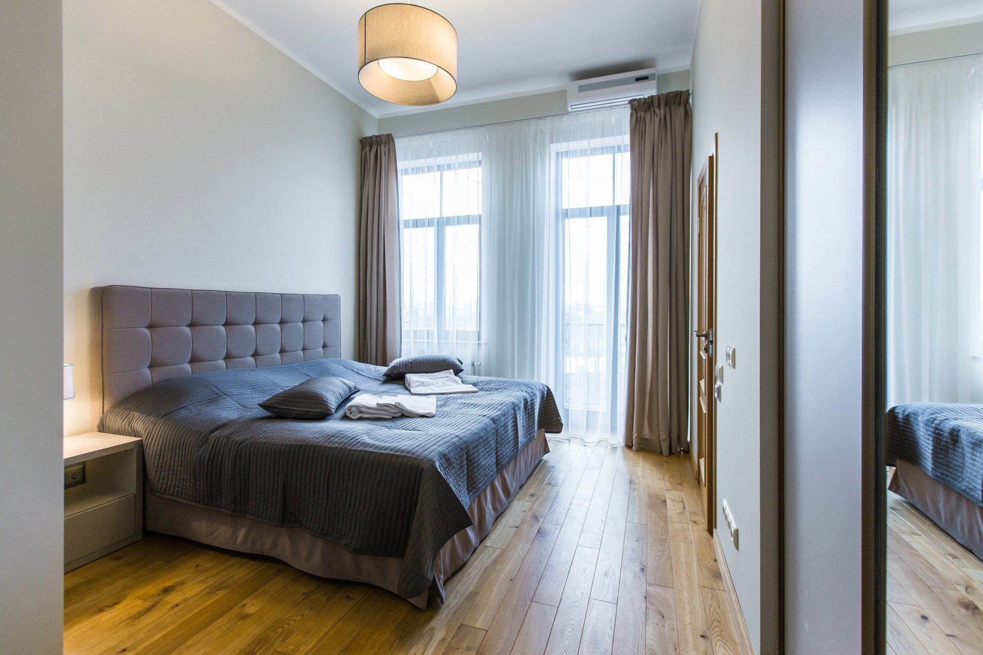 There is a large bed in the middle of the room.