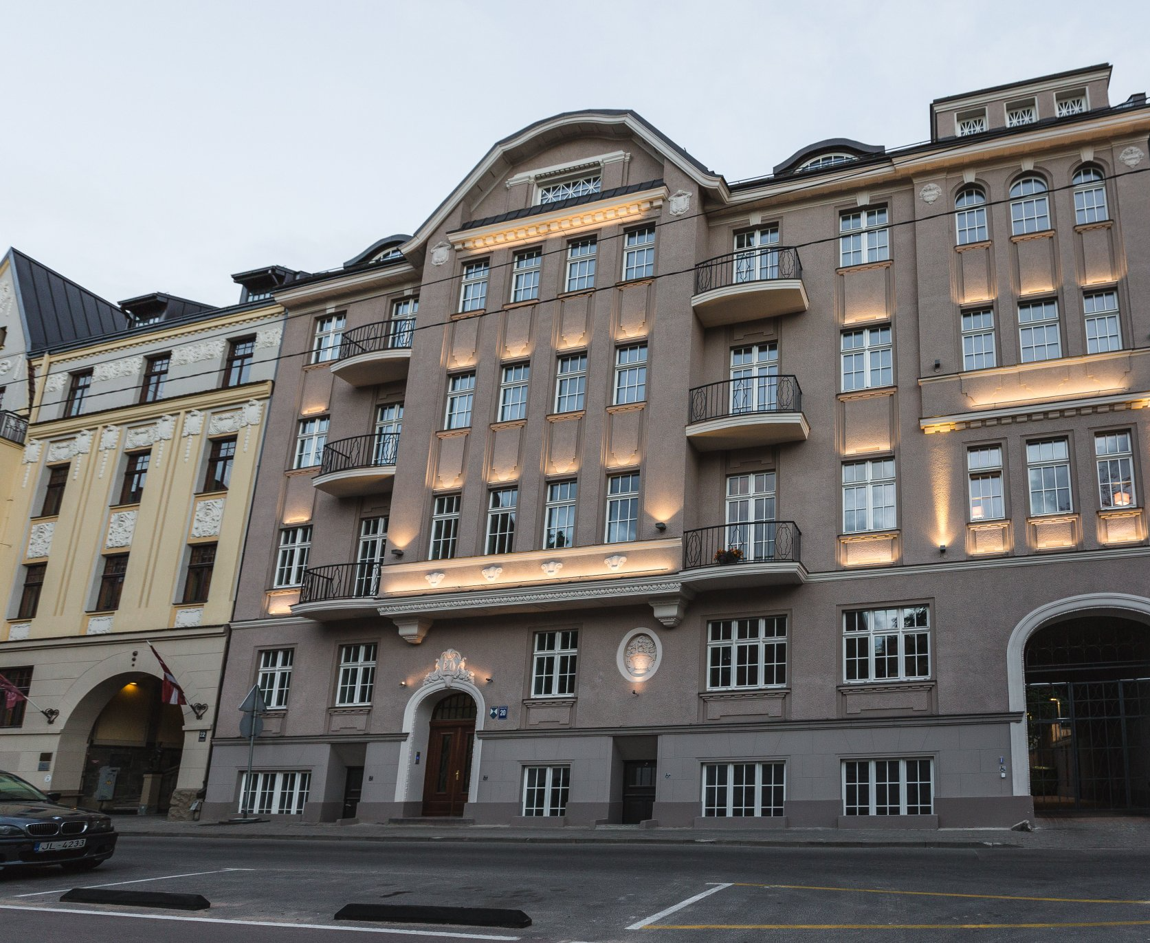 A large building with a lot of windows and balconies