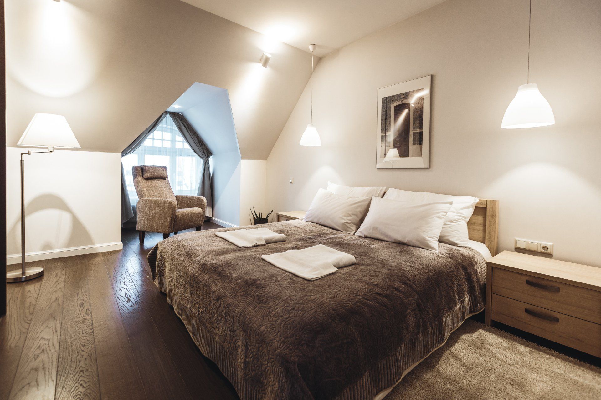 There is a large bed in the middle of the room.
