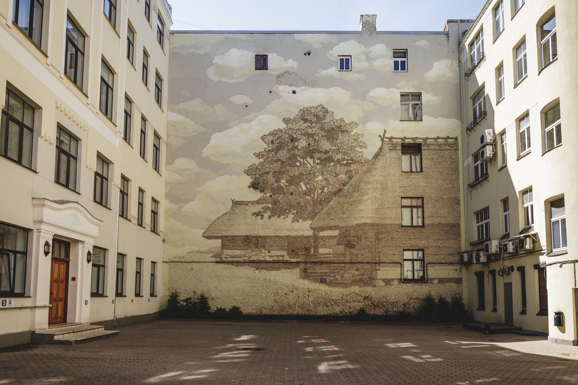 A building with a painting on the side of it