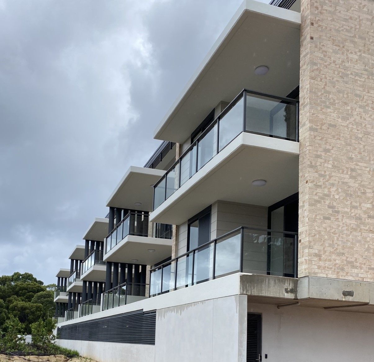 Modern Stylish Glass And Stainless Steel Railing Around Pool — Fabricator In Coffs Harbour, NSW