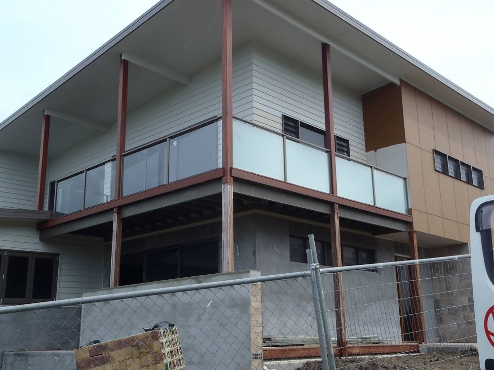A Large house with a steel fabricated balustrade around it — Fabricator In Coffs Harbour, NSW