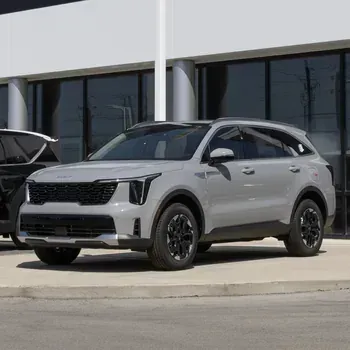 Silver SUV parked outside a modern building