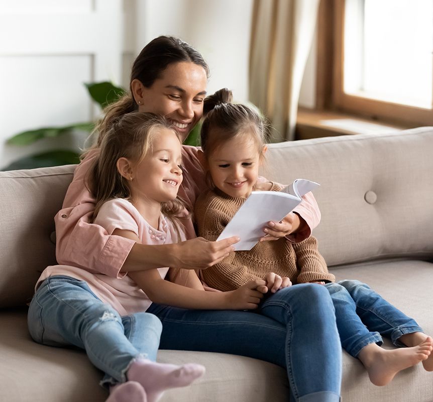 Happy Woman And Her Two Daughters