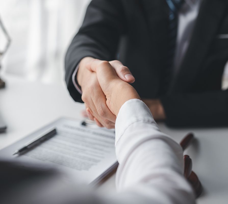 Lawyer Handshaking To Client