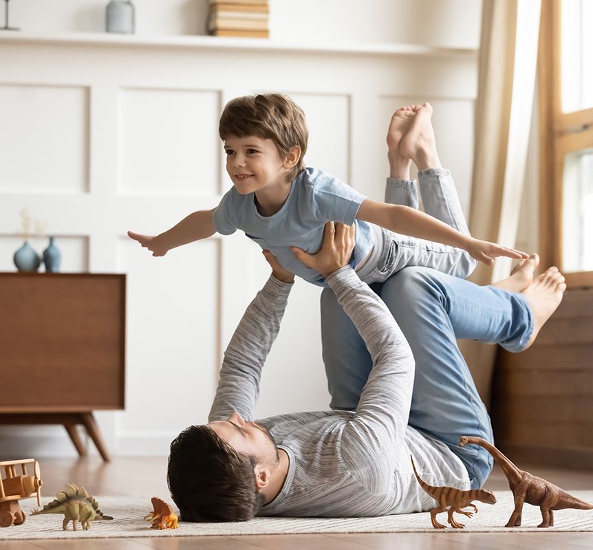 Man Playing With His Son