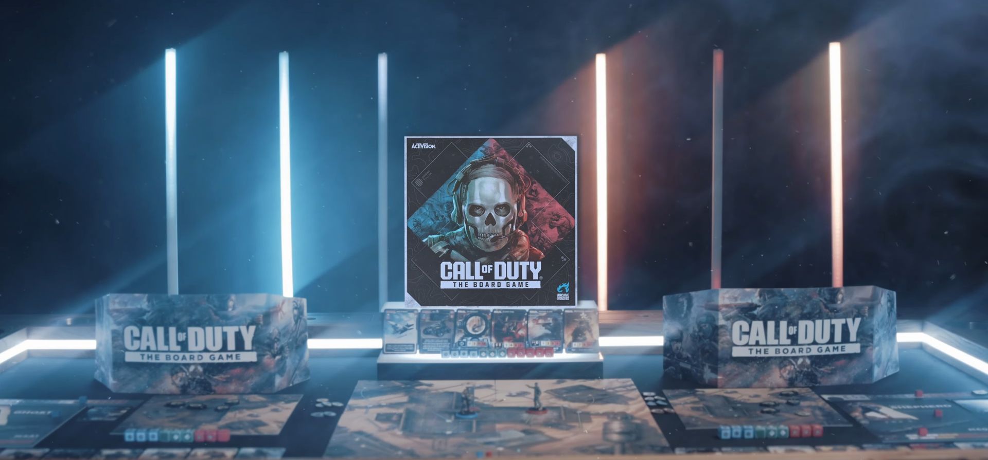 Call of Duty: Mobile box in a futuristic display with lighting effects and map illustrations.
