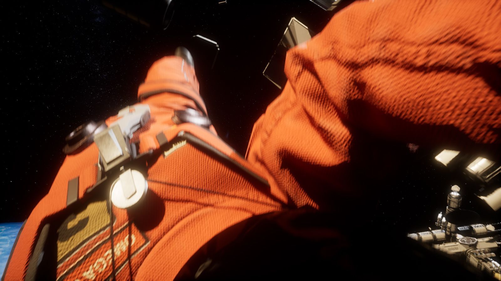 Orange spacesuit close-up with a visible wrist-mounted device, against a backdrop of space and a distant structure.