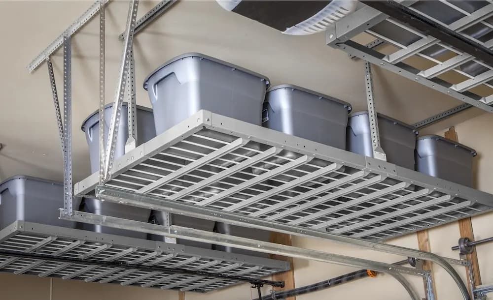 Metal storage shelves with gray bins in a utility room