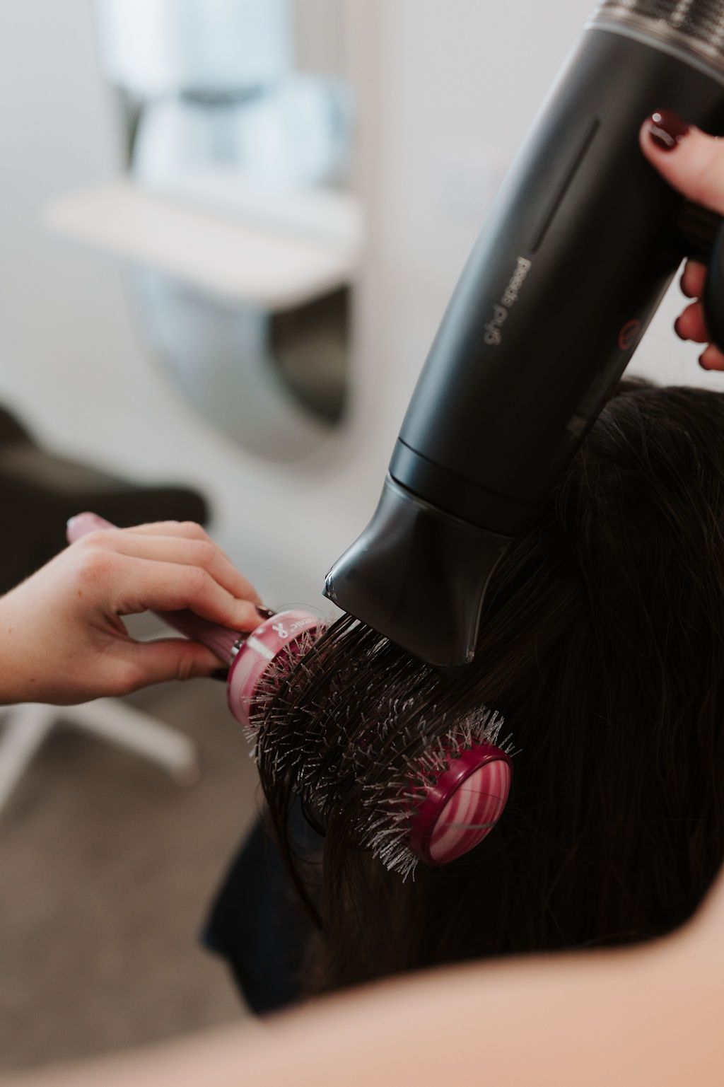 A Woman Is Getting Her Hair Dyed In A Salon — Rowe Street Collective In Shepparton, VIC