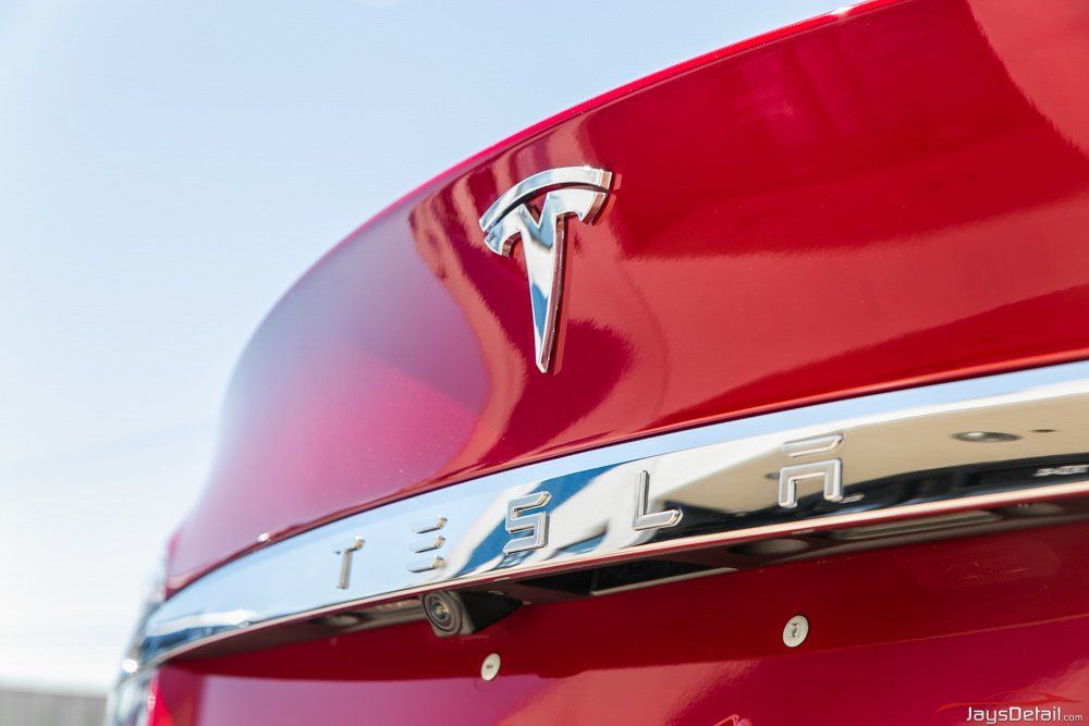 Red Tesla trunk with silver 