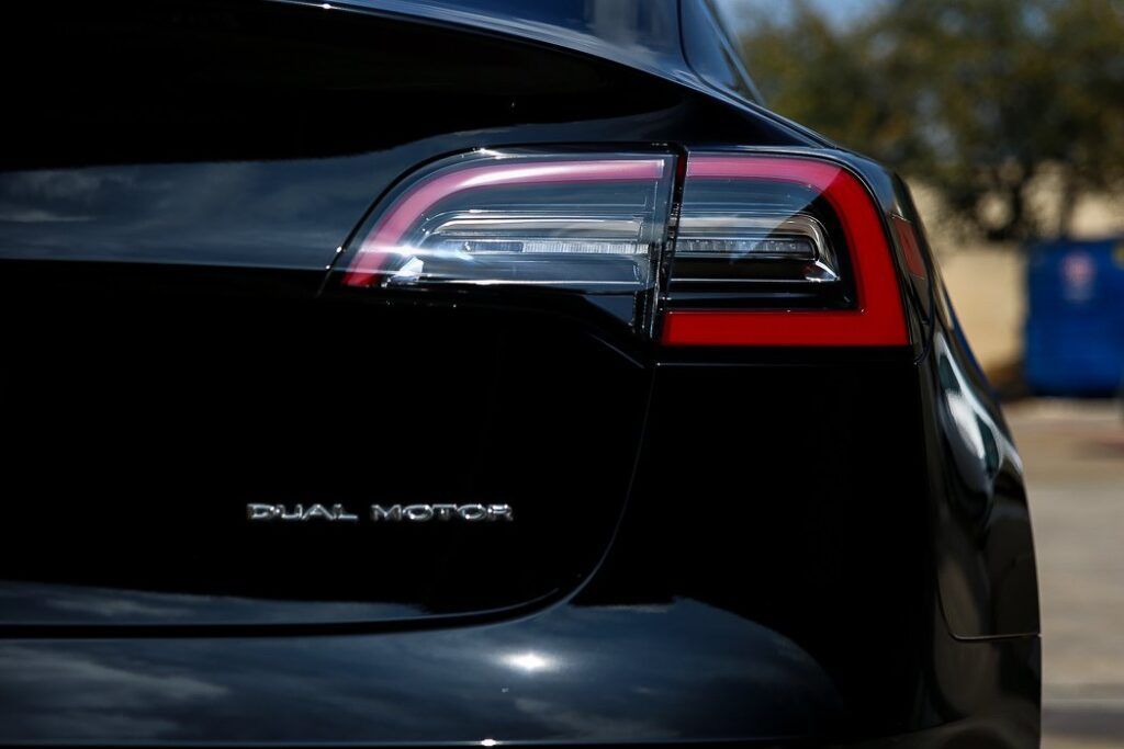 Black Tesla Model 3's rear with