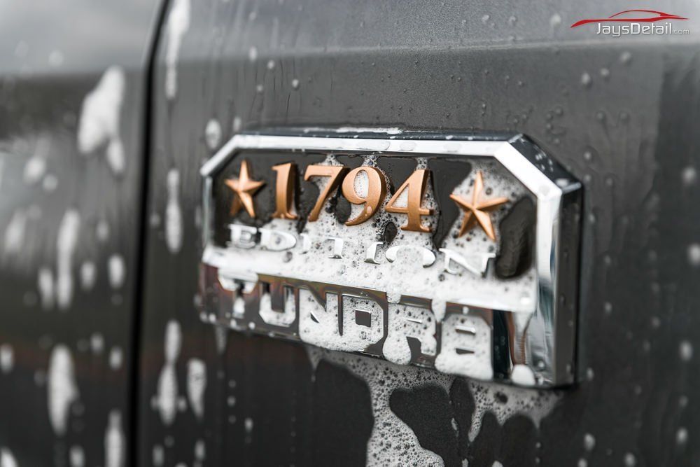 Close-up of a black Toyota Tundra emblem with
