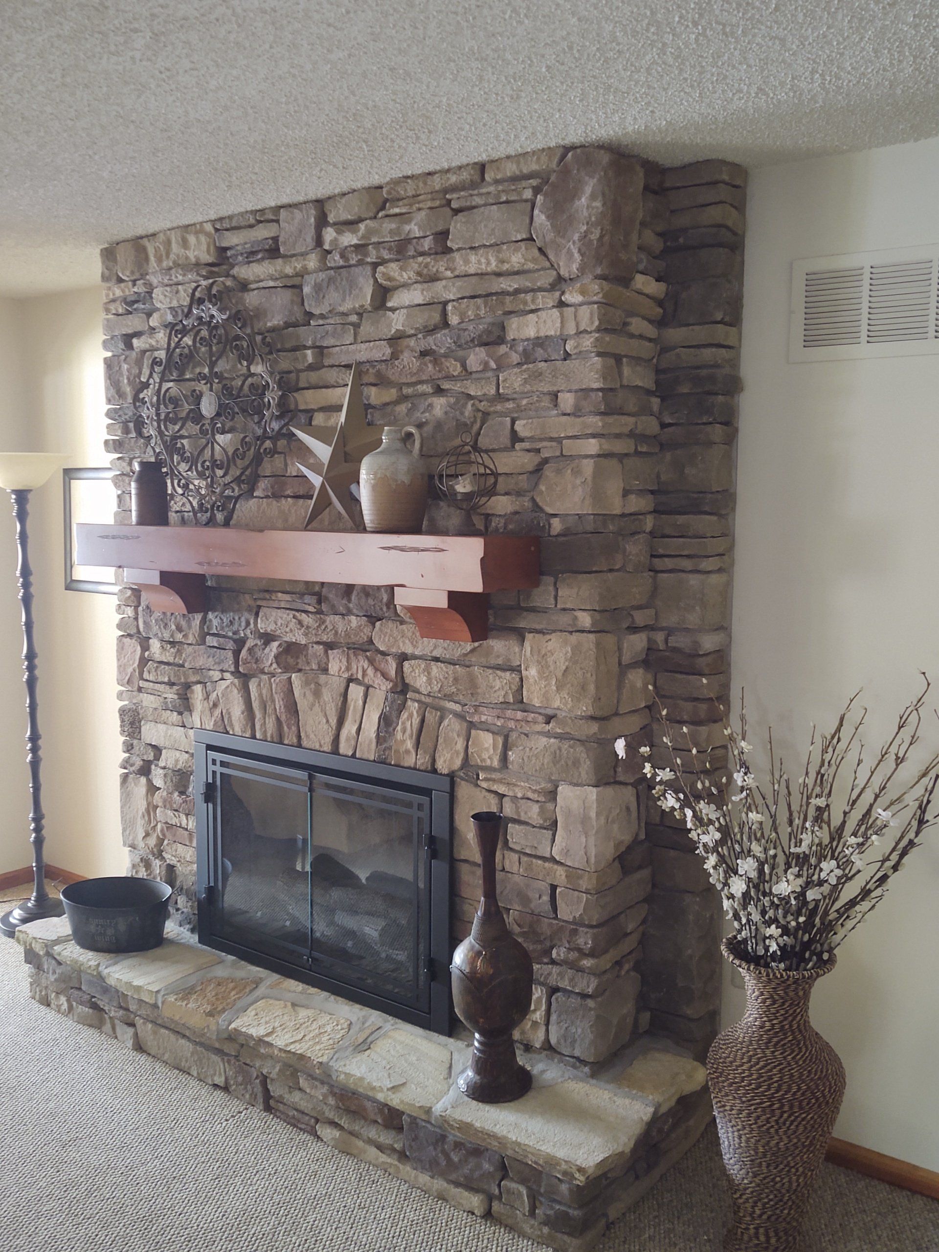 Chardonnay southern ledge and fieldstone mix fireplace