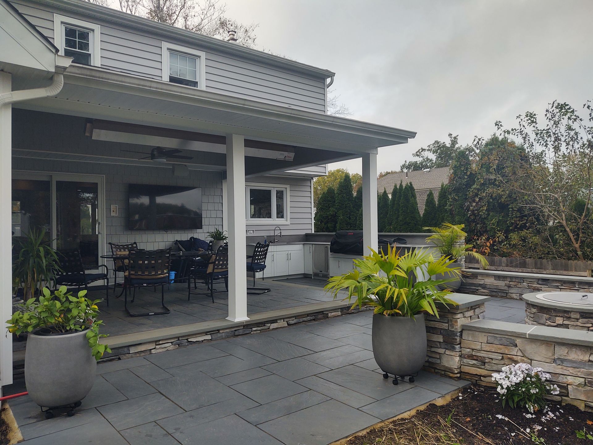 Luxurious Stone Fronts - A Gray House With Stone Fronts in Langhorne, PA